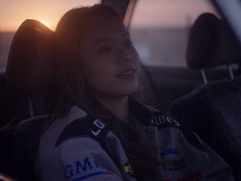 Movie still from “G FLIP - I Am Not Afraid” (2019), directed by Lucy Knox – Close Up shot, Low angle