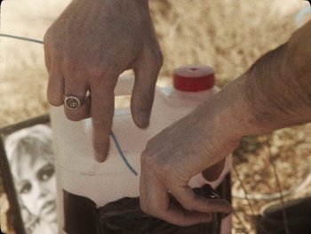 Movie still from “Los Ojos - Por wasap” (2019), directed by Kirkpatrick Buffet – Extreme Close Up shot, High angle