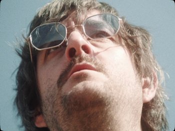 Movie still from “Los Ojos - Por wasap” (2019), directed by Kirkpatrick Buffet – Extreme Close Up shot, Low angle
