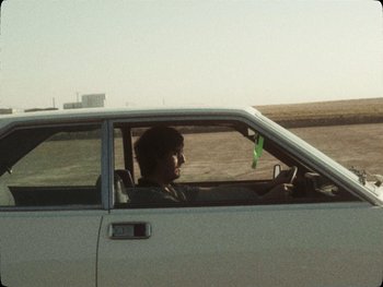 Movie still from “Los Ojos - Por wasap” (2019), directed by Kirkpatrick Buffet – Wide shot, High angle