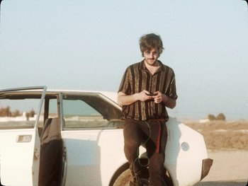 Movie still from “Los Ojos - Por wasap” (2019), directed by Kirkpatrick Buffet – Medium shot, Low angle