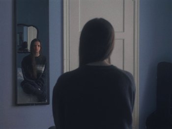 Movie still from “Gracie Gray - Morphine” (2019), directed by Michael Priestley – Medium shot, Over the shoulder angle