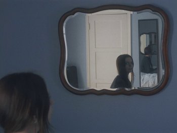 Movie still from “Gracie Gray - Morphine” (2019), directed by Michael Priestley – Extreme Close Up shot, Over the shoulder angle