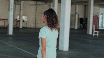 Movie still from “Clare Bowditch - Woman” (2019), directed by Lucy Knox – Medium shot, Over the shoulder angle