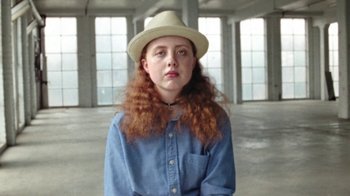 Movie still from “Clare Bowditch - Woman” (2019), directed by Lucy Knox – Close Up shot, Low angle
