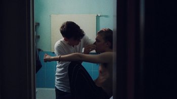 Movie still from “Onni Boi - Tides” (2019), directed by Kristian Lindén – Medium shot, Over the shoulder angle