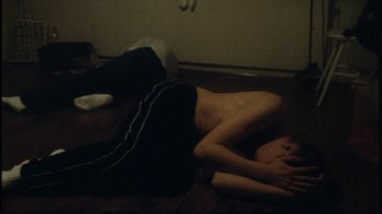 Movie still from “Onni Boi - Tides” (2019), directed by Kristian Lindén – Medium shot, Overhead angle