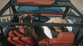 Movie still from “Leven Kali & Syd - Do U Wrong” (2019), directed by Kevin Lombardo – Medium shot, Low angle