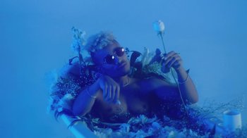 Movie still from “Leven Kali & Syd - Do U Wrong” (2019), directed by Kevin Lombardo – Medium shot, Low angle