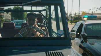 Movie still from “Leven Kali & Syd - Do U Wrong” (2019), directed by Kevin Lombardo – Medium shot, Low angle