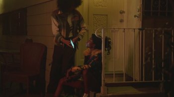 Movie still from “Leven Kali & Syd - Do U Wrong” (2019), directed by Kevin Lombardo – Medium shot, Low angle