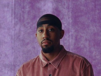 Movie still from “Gus Dapperton - Fill Me Up Anthem” (2019), directed by Gus Dapperton – Close Up shot, Low angle