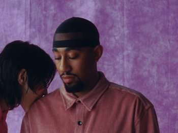 Movie still from “Gus Dapperton - Fill Me Up Anthem” (2019), directed by Gus Dapperton – Close Up shot, High angle