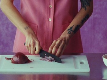 Movie still from “Gus Dapperton - Fill Me Up Anthem” (2019), directed by Gus Dapperton – Extreme Close Up shot, Overhead angle