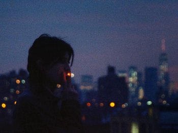 Movie still from “Gus Dapperton - Fill Me Up Anthem” (2019), directed by Gus Dapperton – Extreme Close Up shot, Over the shoulder angle