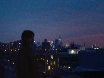 Movie still from “Gus Dapperton - Fill Me Up Anthem” (2019), directed by Gus Dapperton – Wide shot, Low angle