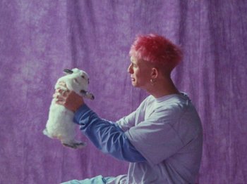 Movie still from “Gus Dapperton - Fill Me Up Anthem” (2019), directed by Gus Dapperton – Medium shot, High angle