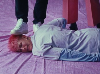 Movie still from “Gus Dapperton - Fill Me Up Anthem” (2019), directed by Gus Dapperton – Medium shot, High angle