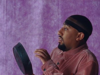 Movie still from “Gus Dapperton - Fill Me Up Anthem” (2019), directed by Gus Dapperton – Close Up shot, Low angle