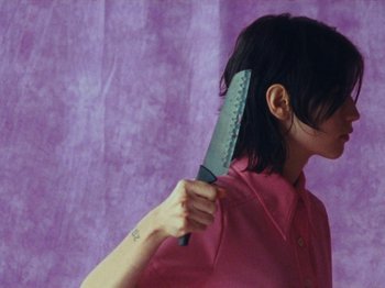 Movie still from “Gus Dapperton - Fill Me Up Anthem” (2019), directed by Gus Dapperton – Medium shot, High angle