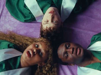 Movie still from “Gus Dapperton - Fill Me Up Anthem” (2019), directed by Gus Dapperton – Medium shot, Overhead angle