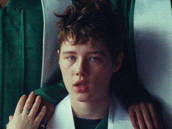 Movie still from “Gus Dapperton - Fill Me Up Anthem” (2019), directed by Gus Dapperton – Close Up shot, Over the shoulder angle