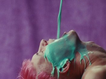 Movie still from “Gus Dapperton - Fill Me Up Anthem” (2019), directed by Gus Dapperton – Extreme Close Up shot, Overhead angle