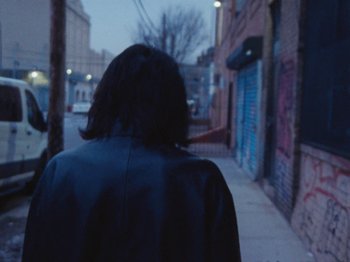 Movie still from “Gus Dapperton - Fill Me Up Anthem” (2019), directed by Gus Dapperton – Medium shot, Low angle