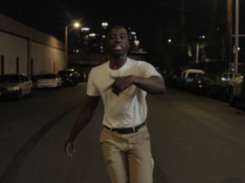 Movie still from “Nana - On My Momma” (2019), directed by Andrew Litten – Medium shot, Low angle