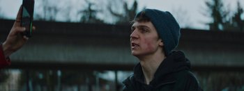 Movie still from “The Tourist Company - Conflicted/Restricted” (2019), directed by Farhad Ghaderi – Close Up shot, Low angle