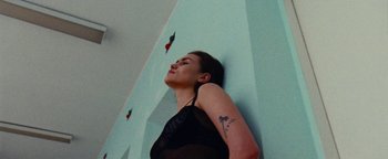 Movie still from “Prospa - Prayer” (2019), directed by João Retorta – Medium shot, Low angle