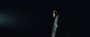 Movie still from “Prospa - Prayer” (2019), directed by João Retorta – Medium shot, Low angle
