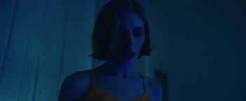 Movie still from “Prospa - Prayer” (2019), directed by João Retorta – Close Up shot, Low angle