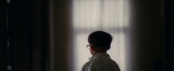 Movie still from “Prospa - Prayer” (2019), directed by João Retorta – Close Up shot, Low angle