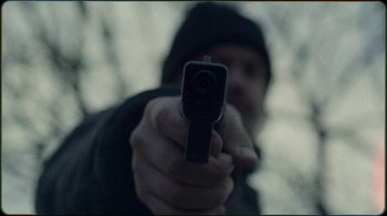 Movie still from “Jesse Markin - Jericho” (2019), directed by Kim Koponen – Extreme Close Up shot, Over the shoulder angle