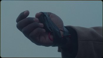 Movie still from “Jesse Markin - Jericho” (2019), directed by Kim Koponen – Extreme Close Up shot, High angle