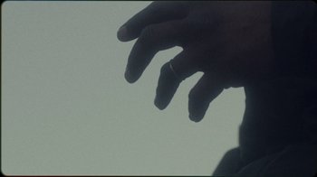 Movie still from “Jesse Markin - Jericho” (2019), directed by Kim Koponen – Extreme Close Up shot, Low angle