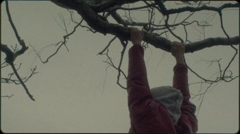 Movie still from “Jesse Markin - Jericho” (2019), directed by Kim Koponen – Extreme Close Up shot, Low angle