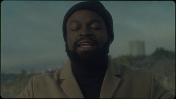 Movie still from “Jesse Markin - Jericho” (2019), directed by Kim Koponen – Close Up shot, Low angle