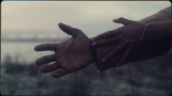 Movie still from “Jesse Markin - Jericho” (2019), directed by Kim Koponen – Extreme Close Up shot, Overhead angle