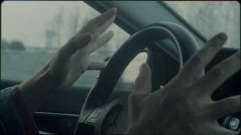 Movie still from “Jesse Markin - Jericho” (2019), directed by Kim Koponen – Extreme Close Up shot, High angle