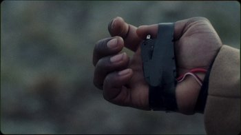 Movie still from “Jesse Markin - Jericho” (2019), directed by Kim Koponen – Extreme Close Up shot, Overhead angle