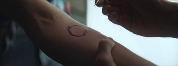 Movie still from “Masasolo - Just as Real” (2019), directed by Ida Andreasen – Extreme Close Up shot, High angle