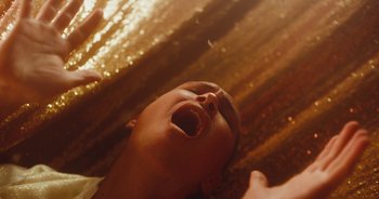 Movie still from “Majetic - Lead Halo” (2019), directed by Jillian Iscaro – Extreme Close Up shot, Low angle