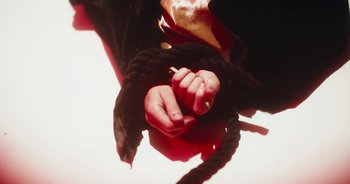 Movie still from “Majetic - Lead Halo” (2019), directed by Jillian Iscaro – Extreme Close Up shot, Overhead angle