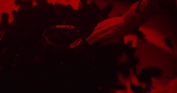 Movie still from “Majetic - Lead Halo” (2019), directed by Jillian Iscaro – Extreme Close Up shot, Overhead angle