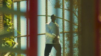 Movie still from “Huey Briss - Regardless” (2019), directed by Michael Priestley – Wide shot, Low angle