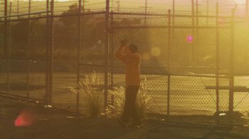 Movie still from “Huey Briss - Regardless” (2019), directed by Michael Priestley – Wide shot, Low angle