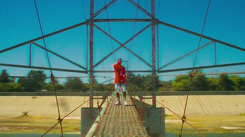 Movie still from “Huey Briss - Regardless” (2019), directed by Michael Priestley – Wide shot, Overhead angle
