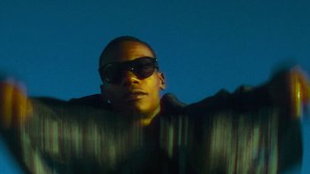 Movie still from “Huey Briss - Regardless” (2019), directed by Michael Priestley – Close Up shot, Low angle
